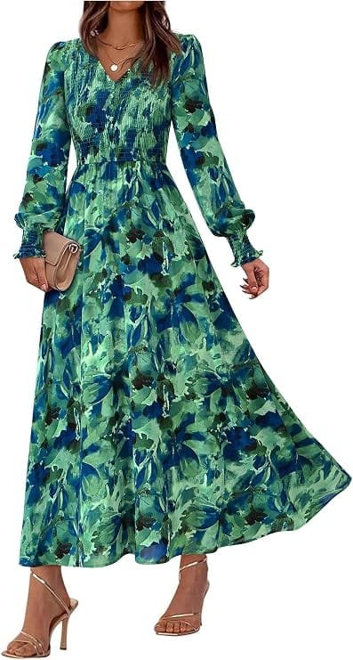 Best Summer Dresses 2026 You Need in Your Wardrobe 5 A model wearing the BTFBM Women Fall Wedding Guest Dresses 2026 Floral Boho Maxi Dress in floral green, featuring a V-neckline, long sleeves, smocked waist, and side pockets for warm-weather fashion.