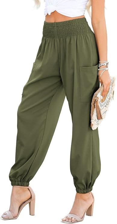 A fashion model wearing Jungle Green Dokotoo Womens Fall Boho Business Casual Smocked 2026 High Waisted Pants paired with a fitted top, showcasing a trendy casual aesthetics outfit ideal for street style inspiration.
