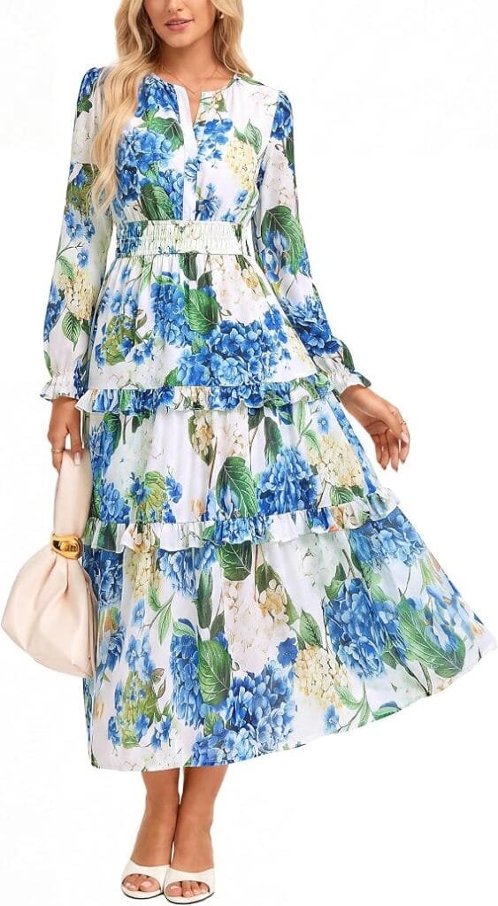 Best Stylish Dresses Under $40 to Refresh Your Wardrobe This Year 3 Full-length front view of a woman wearing a blue floral long-sleeve V-neck maxi dress with a smocked waist and side pockets, styled for autumn events and wedding guest outfits in the UK and USA.