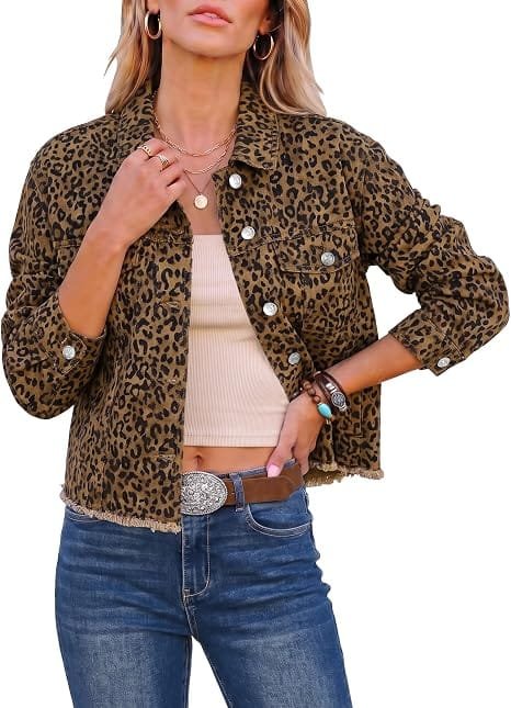 A fashion model wearing the brown cheetah luvamia Brown Cheetah Denim Jacket Fall Clothes for Women Long Sleeves Tops paired with dark jeans, perfect for showcasing an edgy fall casual aesthetics outfit.