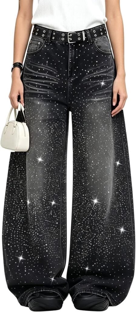 A fashion model posing in the black PEAINJ Sparkly Jeans for Women Baggy Barrel Rhinestone Denim Jeans styled with a chic top, perfect for showcasing an eye-catching casual aesthetics outfit.