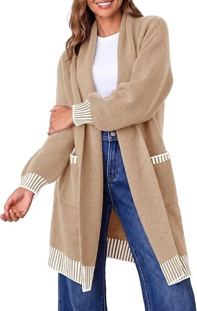 A fashion model wearing the khaki Saodimallsu Womens Fall Oversized Cardigan Open Front Sweaters with Pockets with striped cuffs over jeans, creating a cozy casual aesthetics outfit.