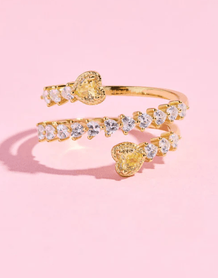 A Mure & Grand yellow Gemini heart sterling silver ring styled for a 2026 summer capsule wardrobe.
