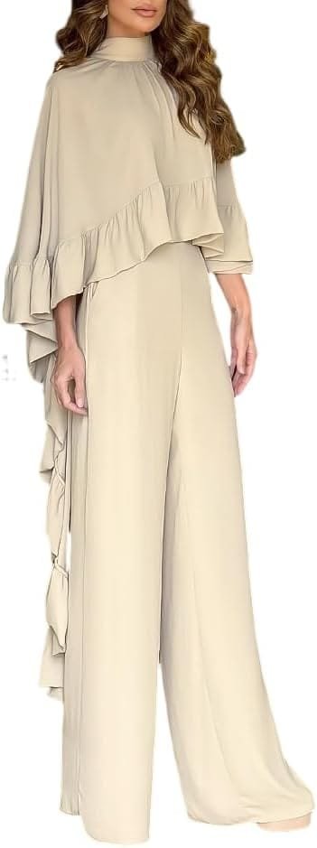 Full-length fashion photography of a model showcasing the CHICME High-Low Ruffled Cape Top & Wide-Leg Pants Matching Set in a warm apricot tone, featuring a flowing cape overlay and tailored wide-leg trousers designed for luxury travel and high-end evening events.