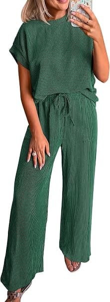Full-length product photography of a model wearing the KIRUNDO 2 Piece Sets for Women Dressy Matching Lounge Set in a rich brown colorway, featuring a short-sleeve vertical ribbed top and matching drawstring wide-leg pants tailored for travel and everyday comfort.