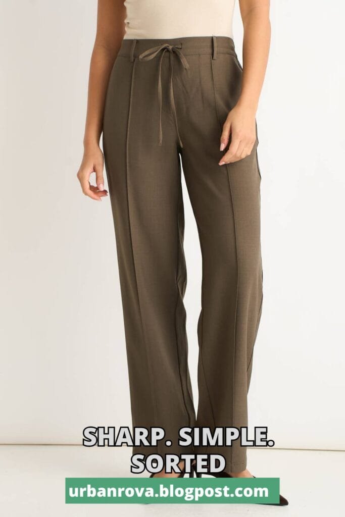 The Perfect Office Capsule Wardrobe: 2026 Work Essentials Guide 8 Marl grey tailored trousers with an elasticated waistband and drawstring detail.