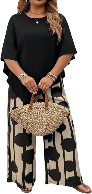 Full-length studio photography of a plus-size model wearing the SOLY HUX Women's Plus Size Summer Vacation Outfits featuring a black half-sleeve asymmetrical blouse and matching printed wide-leg trousers designed for summer resort and vacation wear.