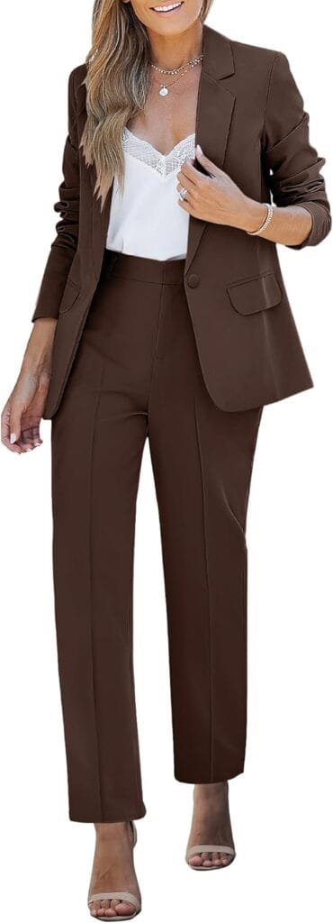 The Complete Business Casual Guide for Women (2026) 2 Woman wearing a dark brown blazer and wide-leg pantsuit, a classic women's business casual outfit idea for the office in 2026 Caption: business casual guide for women - outfit example