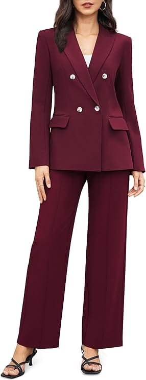 The Complete Business Casual Guide for Women (2026) 7 Woman wearing a wine red double-breasted blazer and wide-leg pants, an elegant women's business casual outfit for 2026