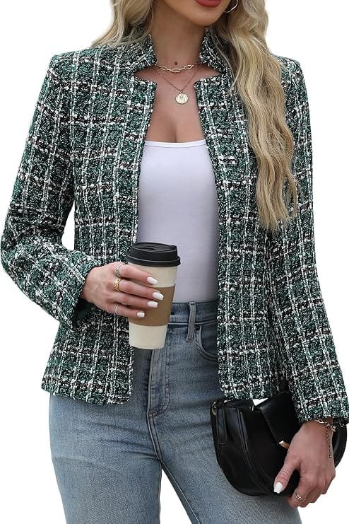 The Complete Business Casual Guide for Women (2026) 4 Woman wearing a green tweed open-front blazer over jeans, a smart casual dress code outfit idea for the office in 2026