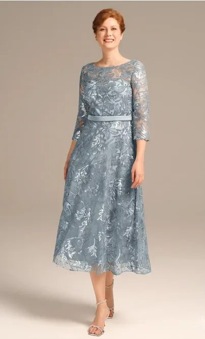 Elegant AW Larissa mist mother of the bride dress, featuring a sophisticated and flowy silhouette perfect for formal wedding guest attire.