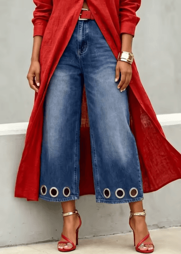 25 Minimalist Capsule Wardrobe Essentials 2026 | Timeless Pieces Every Woman Needs 12 A model wearing high-waisted, blue cropped wide-leg denim jeans with delicate eyelet-trim detailing along the hem, styled for a modern and stylish summer 2026 outfit.
