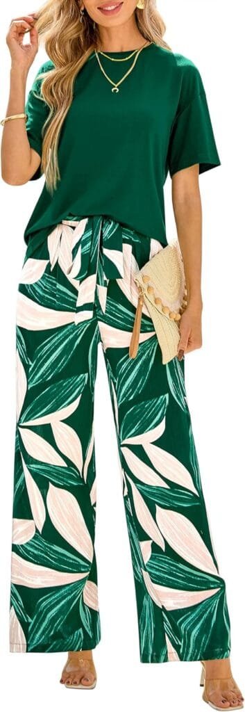 Elegant Summer Outfits 2026: Effortlessly Chic Looks You'll Love 20 Fashion model wearing elegant summer outfits featuring the PRETTYGARDEN dark green short-sleeve knit top and floral wide-leg pants set, styled for a summer vacation in the UK and USA.