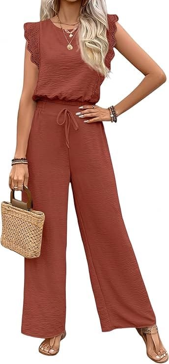 Business Casual Outfits for Women: 15 Best Work-Ready Looks for 2026 9 Professional two-piece business casual summer outfit for women featuring a sleeveless lace-trim ruffle top and matching high-waisted wide-leg pants in an orange rust tone, styled with a handbag for work and travel wear.