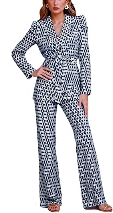 Business Casual Outfits for Women: 15 Best Work-Ready Looks for 2026 13 Professional long-sleeve two-piece business casual pantsuit for women featuring an oversized tailored blazer and matching trousers, styled for modern corporate office and executive workwear.Business casual outfits for women — tailored blazer and trouser set