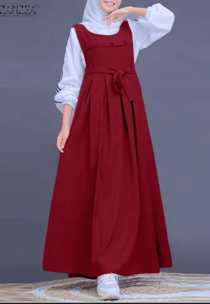 25 Minimalist Capsule Wardrobe Essentials 2026 | Timeless Pieces Every Woman Needs 24 A woman wearing a ZANZEA sleeveless Abaya sundress in a solid, minimalist color; a key piece for a modest and elegant 2026 capsule wardrobe.